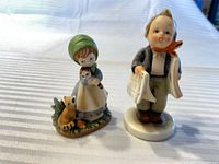 Front view of both figurines