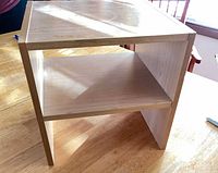 Overall view of cubby shelf showing two tiers