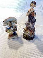 both figurines side by side