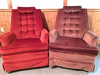 Front view of both velvet tufted swivel chairs showing colors and design