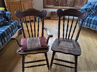 Front view of both chairs showing style and cane seat condition