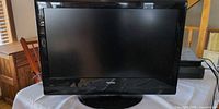 Front view of Toshiba 32-inch LCD TV on stand