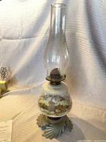 Full view showing chimney, ceramic font with transfer scene and metal base