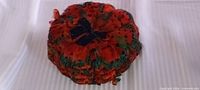 Top view of feather pillbox hat