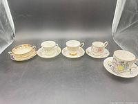 Full set: soup bowl with underplate and four teacup/saucer pairs