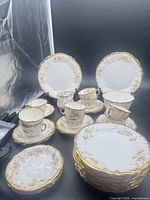 Entire set of plates, cups, saucers displayed