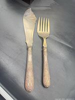 Full view of knife and fork showing size and pattern