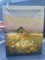 Front view of signed oil painting showing barn, field and overall condition