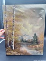 Full view of oil painting showing landscape scene, dent visible upper right