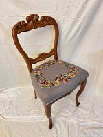 Full view of carved balloon back chair