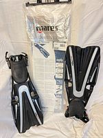 Front view of both Mares Volo Power fins with original bag behind