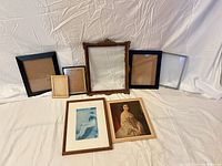 All eight frames displayed together showing variety of sizes and finishes