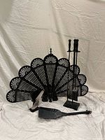 All items grouped: open screen, tool set on stand, loose tools