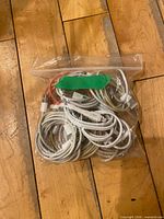 Bag with multiple coiled Lightning cables