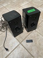 Front view of both Edifier R2000 speakers with remote