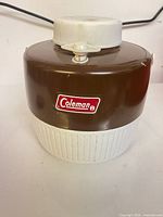 Front view showing Coleman logo, color scheme and handle
