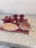 Group shot of all seven pottery items on table