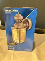 Front of sealed retail box showing model and features