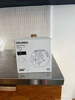 IKEA Knubbig lamp box showing product illustration and branding
