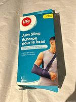 Front of Life Brand arm sling box showing product image and details