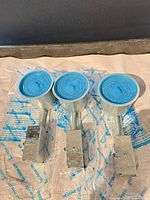 Front view of three Lifeline recessed housings with blue covers