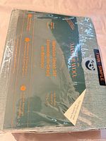 Front view of sealed Master Woo bamboo sheet set package