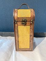 Front view showing map inlay panel, latch, handle