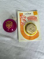 Yo-yo and sealed string pack front view