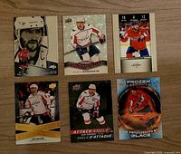 All six Alexander Ovechkin Upper Deck hockey trading cards laid out on a table