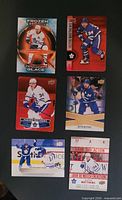 Six Auston Matthews Upper Deck cards laid out showing fronts