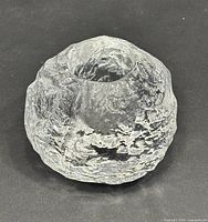 Top angled view showing overall snowball form and texture