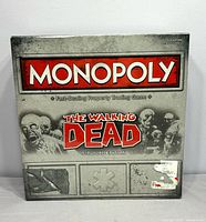 Front of sealed Monopoly The Walking Dead Survival Edition box