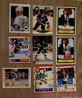 All nine Wayne Gretzky cards laid out in 3×3 grid showing fronts and designs