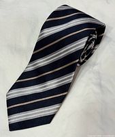 Tie rolled showing stripe pattern and width