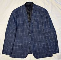 Front view of navy windowpane blazer