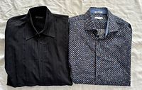 Both shirts folded side by side showing front and patterns