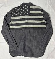 Rear view displaying large U.S. flag graphic