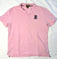 Full view of pink Ralph Lauren Rugby polo shirt