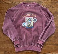Full view of maroon Toronto Blue Jays Champions sweatshirt front