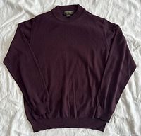 Front view of plum merino wool crewneck sweater