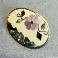 Front view showing inlaid design and materials