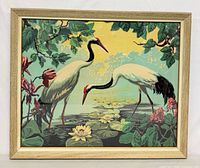 Front view of framed lithograph showing artwork and frame