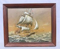 Full view of framed oil painting