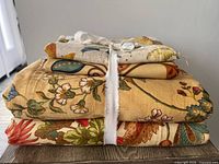 Stacked view of all four folded fabrics tied together