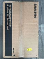 Front view of sealed Samsung box labelled Professional Monitor