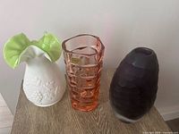 Three vases side by side showing colors and forms