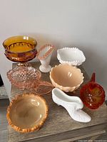 Group shot of all eight glass pieces displaying size and colour variety