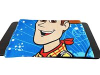 Full view showing Woody's face and upper torso on blue fleece