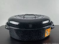 Granite Ware black speckled covered roaster front view