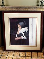 Full view of framed print showing image, mat and frame